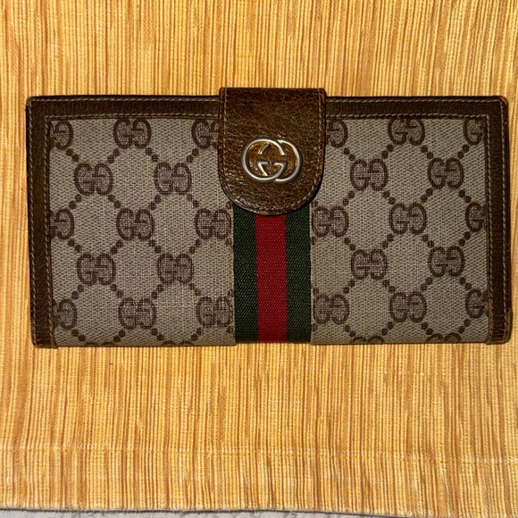 Gucci Handbags - Gucci Dark Brown Leather Wallet with Gold Emblem part of the old Sherry line